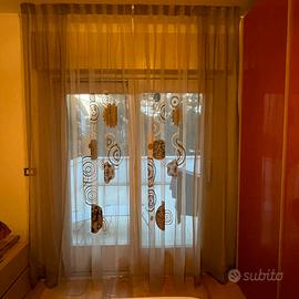 Coppia di tende per interni