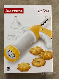 Siringa con stampi per dolci