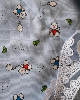 un pezzo di stoffaper corredo bimbo atiezza un met