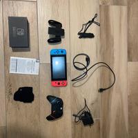 Console Nintendo Switch con Mario Kart e accessori