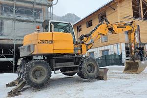 Liebherr 309 Escavatore Gommato