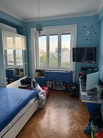 Camera con bagno condiviso