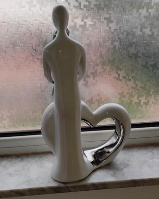 Statuetta d'arredo ceramica e acciaio