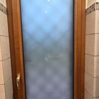 porta in alluminio con inferriata 