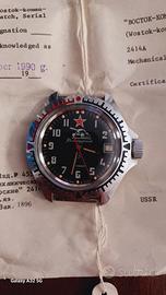 orologio meccanico a carica manual.