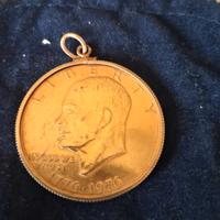 Dollaro commemorativo del 1976, placcato in oro.