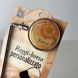 Reggi-borsa Teresa History & Heraldry con papavero