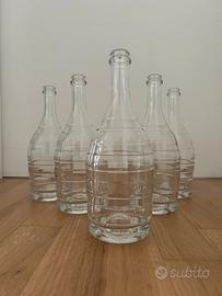 5 Eleganti bottiglie in vetro