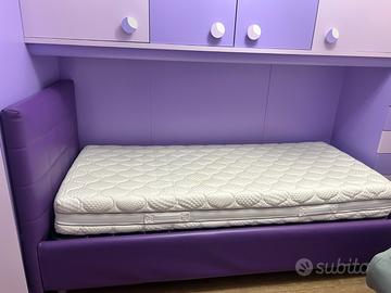 Letto singolo contenitore con testiera trapuntata