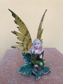 Statua fatina verde bolle di sapone