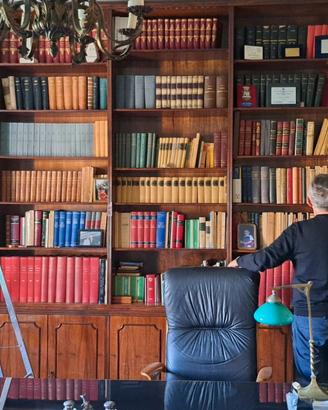 Libreria a tutta parete in palissandro