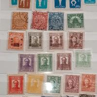 Album con francobolli di Cina e Giappone