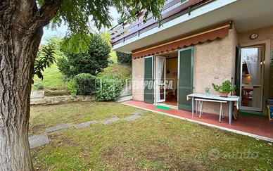 Appartamento con giardino e posto auto