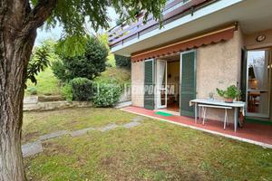 Appartamento con giardino e posto auto