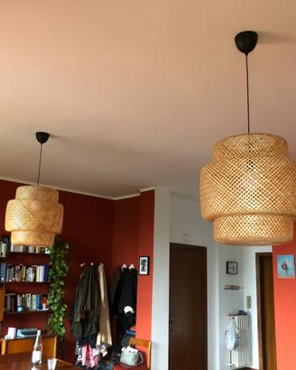 Coppia di lampadari in rattan