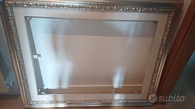 Cornice di legno color argento