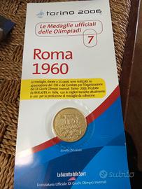 n. 2 medaglie ufficiali delle olimpiadi n. 6 e 7.