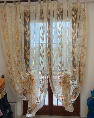 Coppia tende eleganti velate con foglie oro e pass