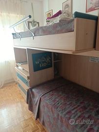 cameretta con due lettini più scrivania  
