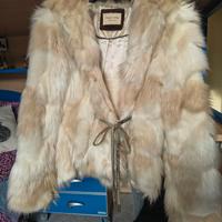 Giubbotto donna in pelliccia ecologica.