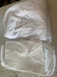 2 lenzuola lettino e 7 carrozzina