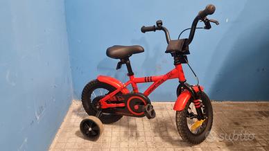 Bici bimbo 3-5 anni Prometheus rossa con rotelle