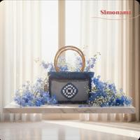 Borsa fatta in cordino e jeans all'uncinetto 