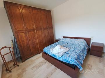 Camera da letto completa in legno