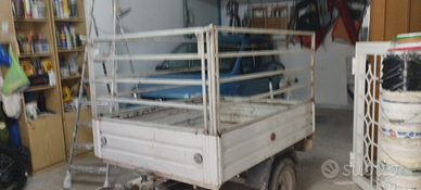 Rimorchio appendice con sponde