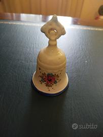 Antica campanella in ceramica dipinta a mano.