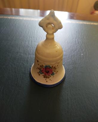 Antica campanella in ceramica dipinta a mano.