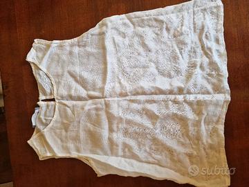 camicia giromanica con bottone dietro 