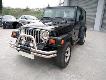 Jeep Wrangler 4.0  cat Sport autom.