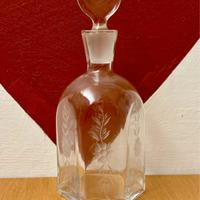 bottiglia in vetro con decorazione 