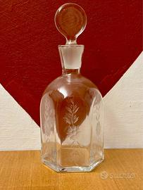 bottiglia in vetro con decorazione 