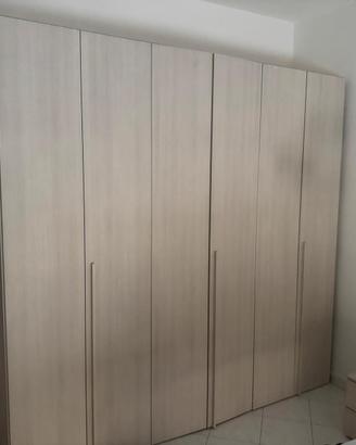 Armadio tre ante  montatore