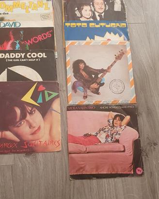 vari dischi vinile 45 giri anni 80