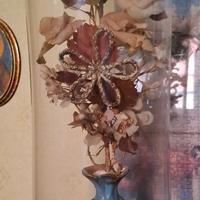 oggetto decorativo sotto campana di vetro 