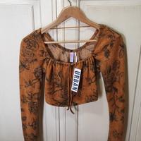 Urban Outfitters out from under top senape nuovo