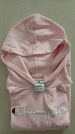 Felpa Champion Rosa con cappuccio e tasche.