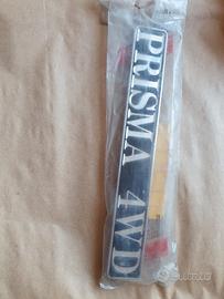 Targhetta posteriore badge sigla Lancia prisma 4WD
