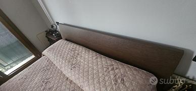 Letto matrimoniale comodini e boiserie di design