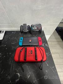 Nintendo Switch Oled + accessori + gioco