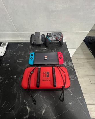 Nintendo Switch Oled + accessori + gioco