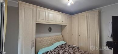 armadio a ponte e letto contenitore