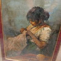 quadro raffigurante donna che cuce 