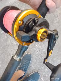 canna traina con mulinello 