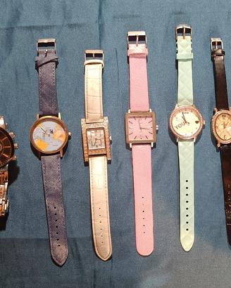 Lotto orologi uomo donna quarzo + bracciale fashio