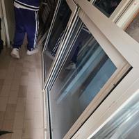 Veranda in alluminio doppia porta scorrevole,vetri