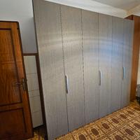 camera da letto armadio e comodini